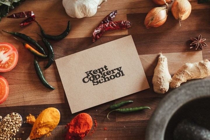 a close up of food and a sign on a table