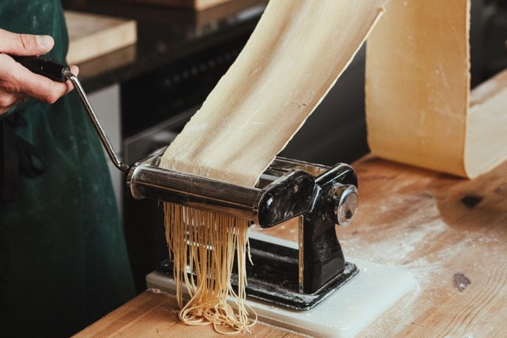 a person making pasta from scratch